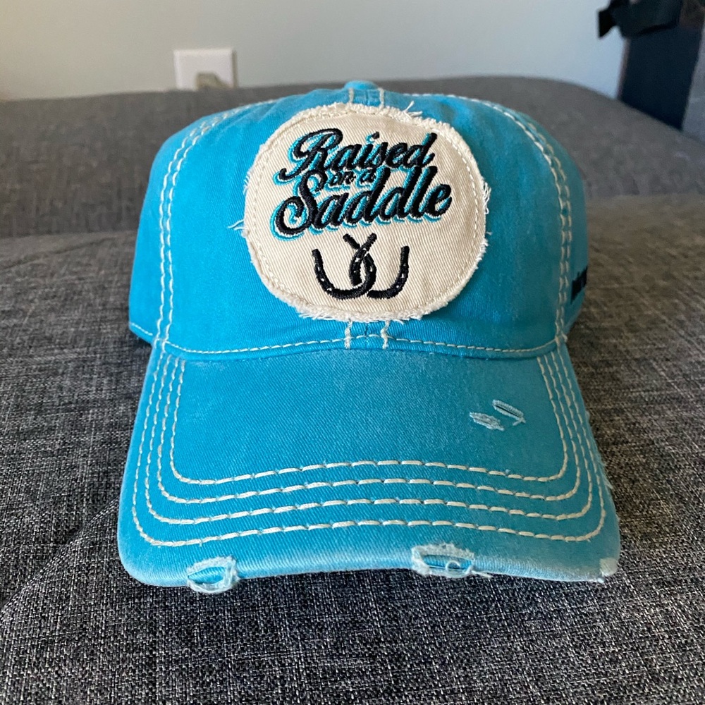 Wrangler Cap “Raised on a Saddle”